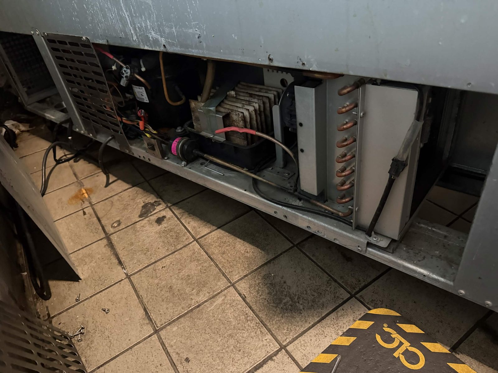 Under-counter commercial refrigeration compressor service
