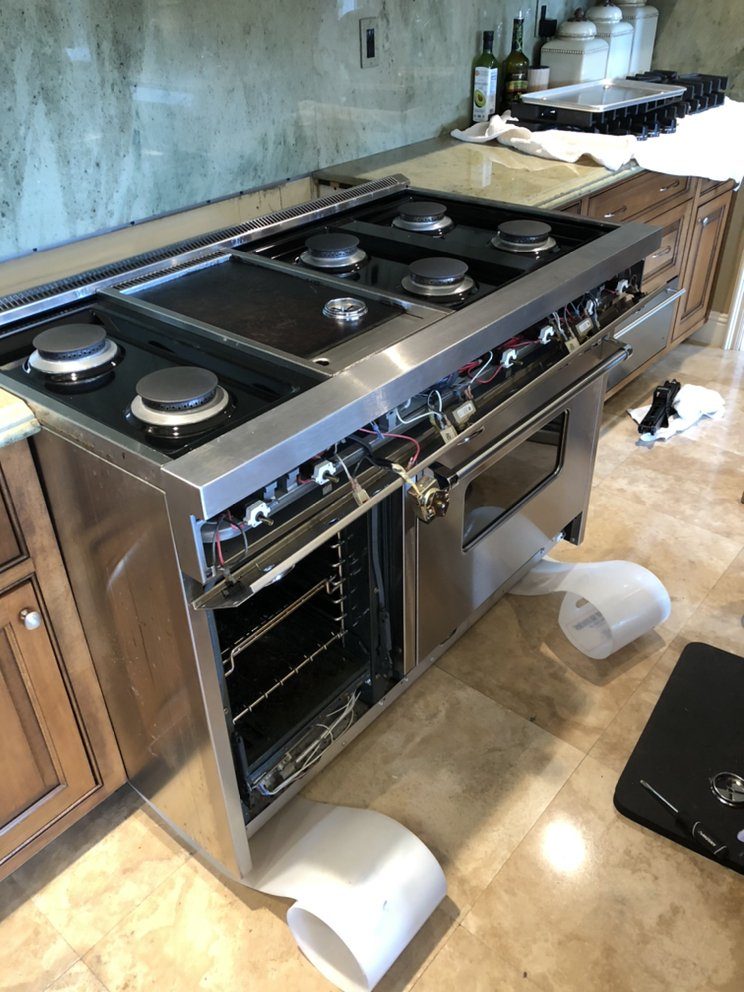 A 48-inch residential range opened up for service