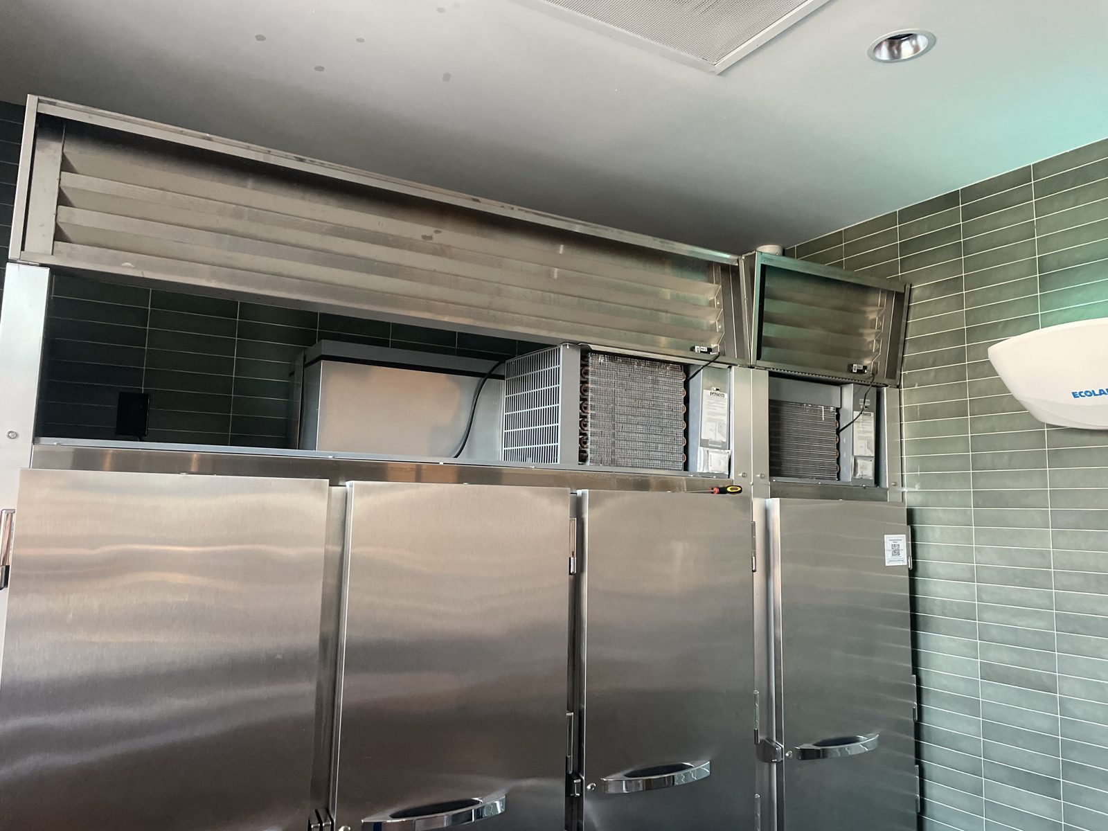 Commercial reach-in refrigerators with condenser units exposed