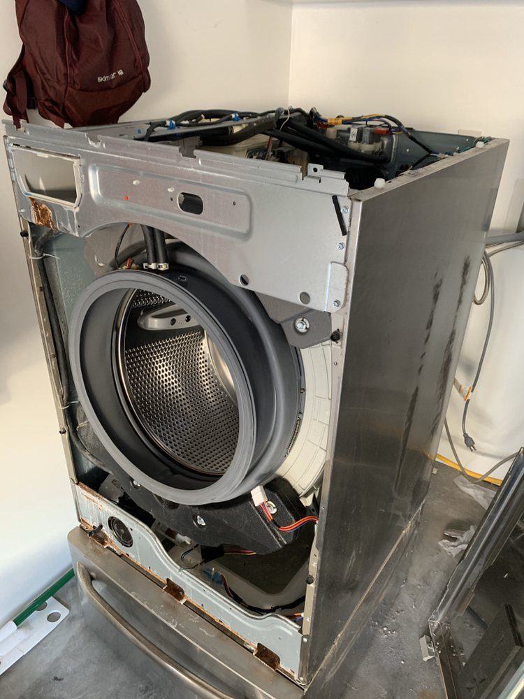 Front-load washer disassembled mid-repair